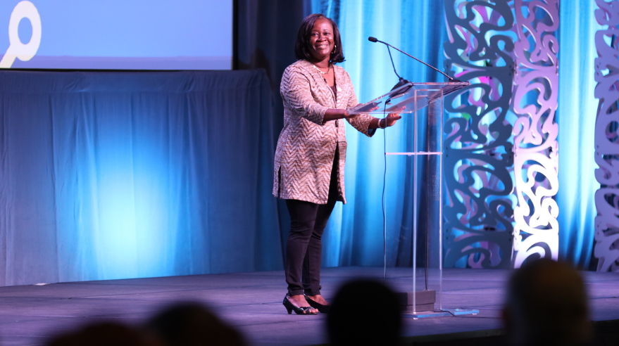 Irene Hulede presents at the Opening Session at ABRCMS 2022. 
